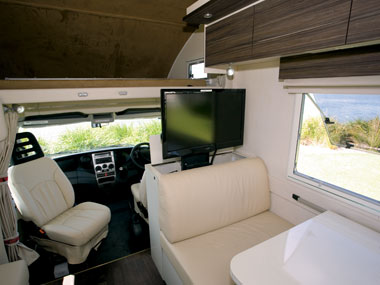 Sunliner Monte Carlo M72 motorhome tv, dinette and front cab