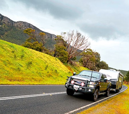 Towing Kokoda caravan on the road