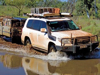 4x4 and camper trailer river crossing