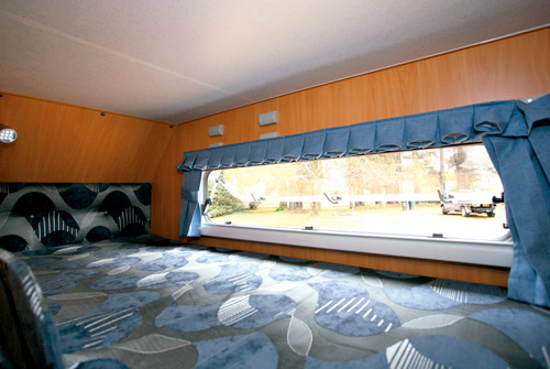 A'van Jenna HT 624 caravan top bunk and view outside