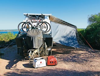 Generators and awnings provide comfort on the road.