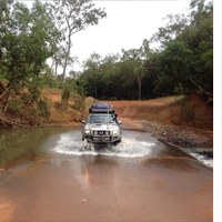 Driving through a water crossing on the Peninsula Developmental Road to Weipa.