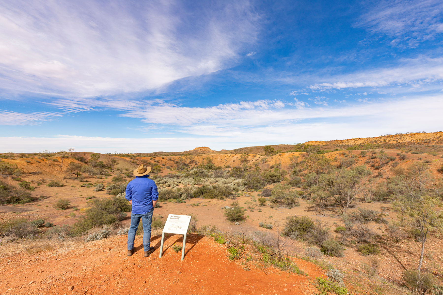 standing on the edge of a meteorite crater