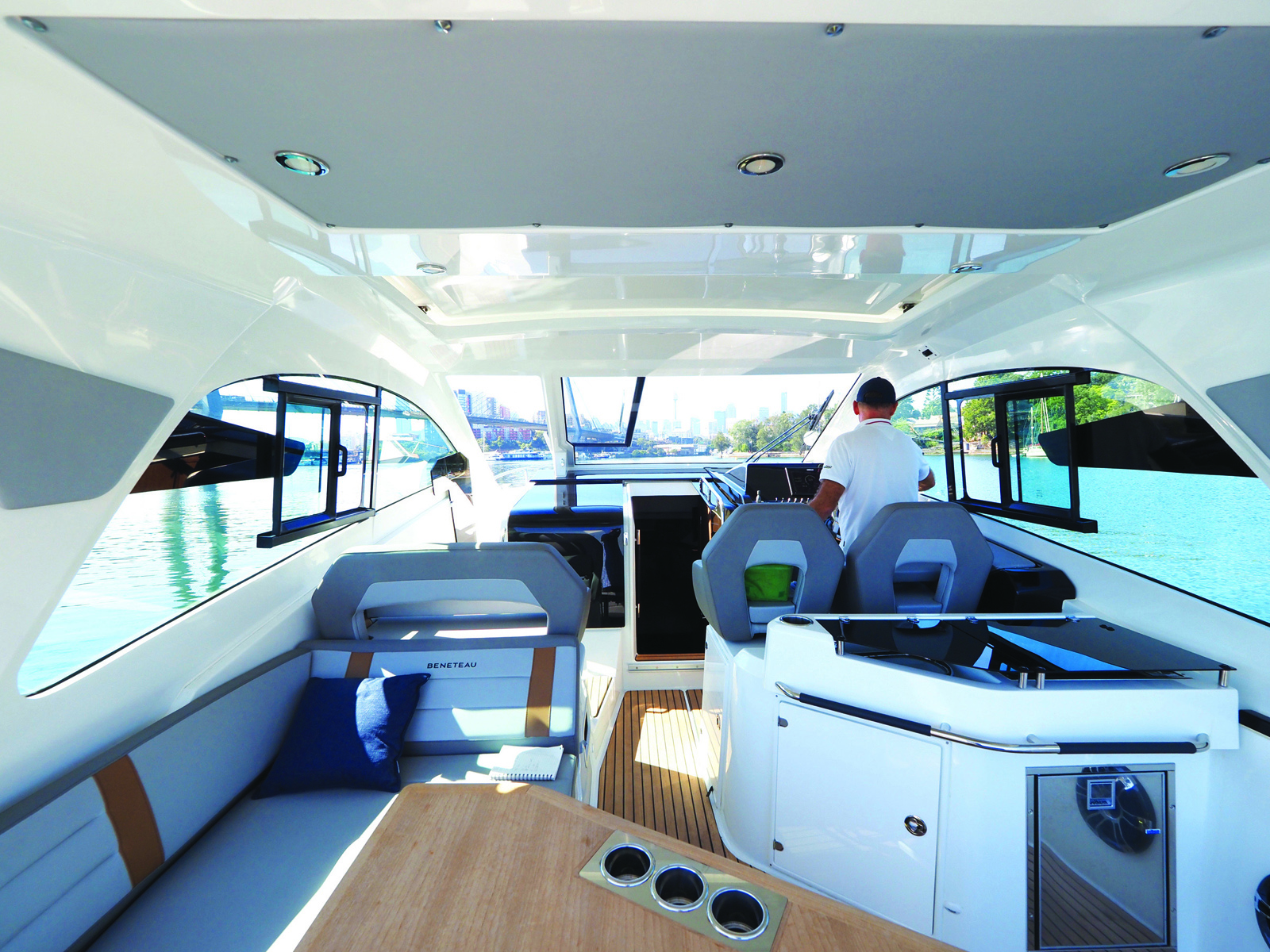 Inside the Beneteau is furbished in whites, greys and wood