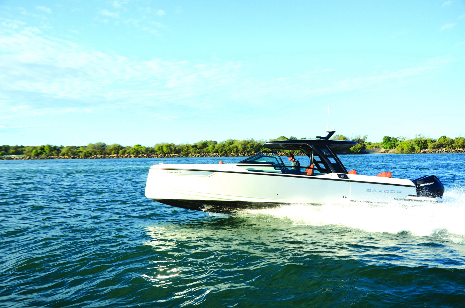 Saxdor boat cruising in the water