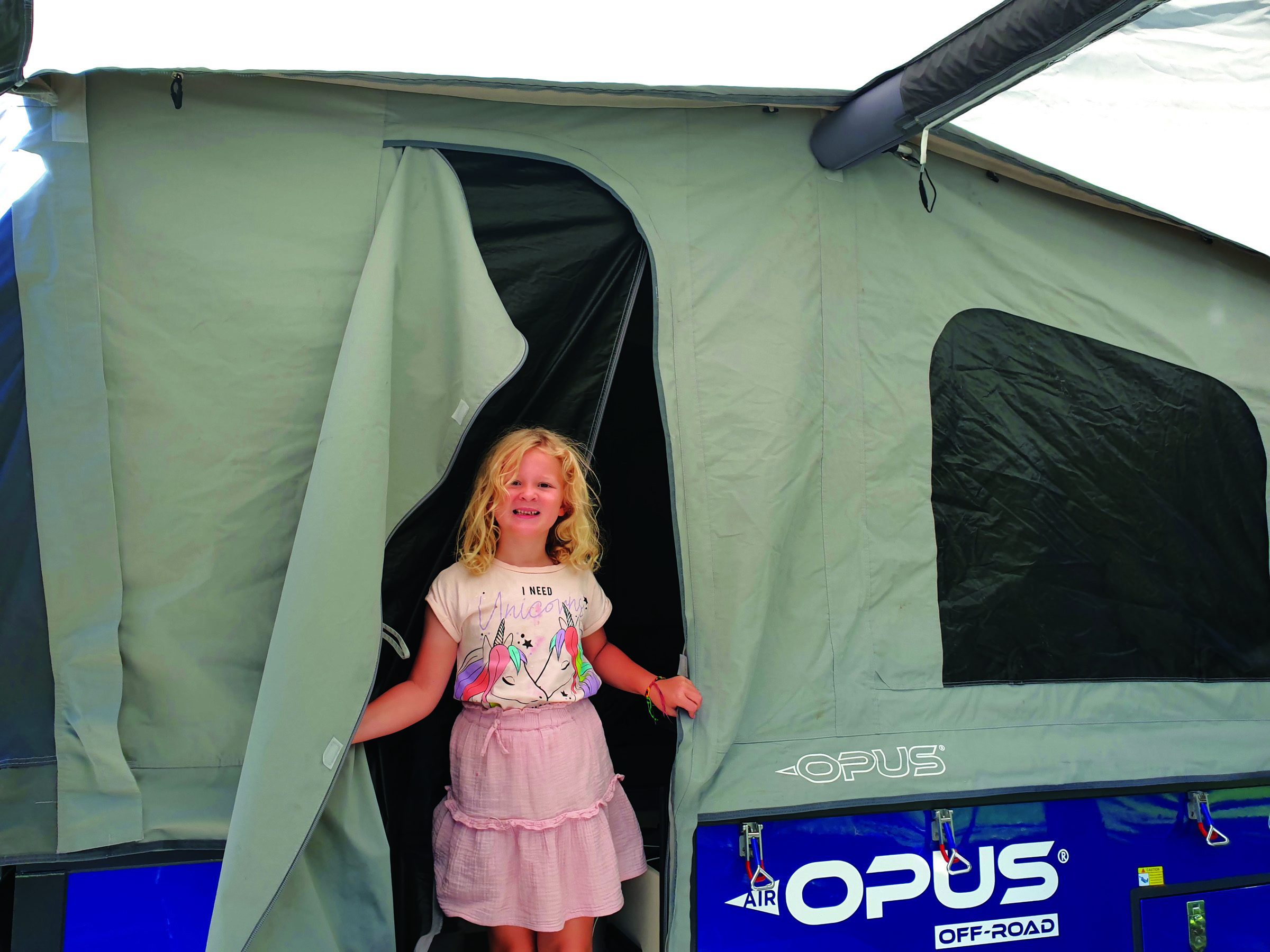 Rob's daughter Georgie in the door of the tent for size reference