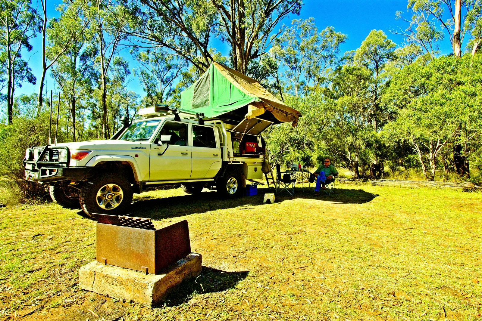 Finding a bit of shade at our serene campsite  in Lake Broadwater Conservation Park